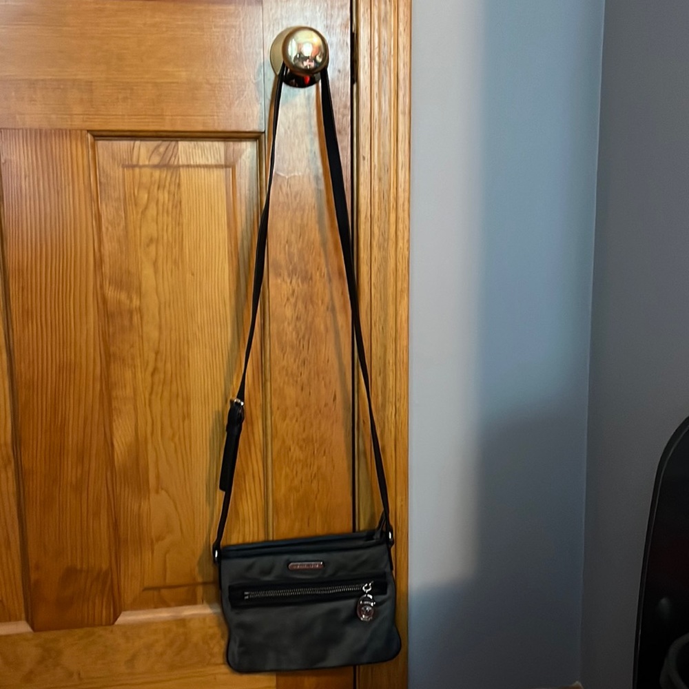 Michael Kors grey and black crossbody bag. Gently used. Good condition